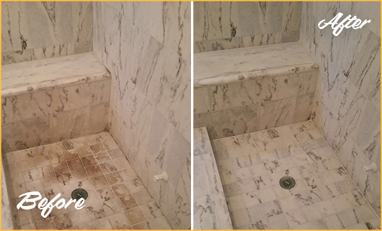 Before and After Picture of a Dirty Woxall Marble Shower Cleaned to Eliminate Dark Stains
